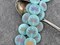 *8* 17mm Satin Matte Aqua Opaline Sliperit Laser Etched Lotus Coin Beads